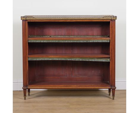 A LOUIS XVI GILT METAL MOUNTED WALNUT OPEN BOOKCASEOn fluted tapering supports, 113cm wide; 30cm deep; 104cm highGood overall