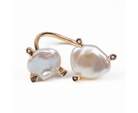 AN ANNOUSHKA 14CT GOLD, DIAMOND AND FRESHWATER CULTURED PEARL RINGIn an abstract design, mounted with two freshwater cultured