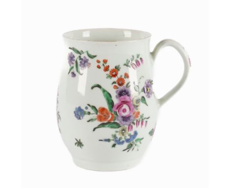 A WORCESTER PORCELAIN BALUSTER MUGCirca 1765-70 Painted with flower groups and sprigs, 12.5cm high. Provenance: Property from