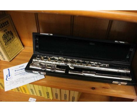 A cased Pearl flute, model PFS01E