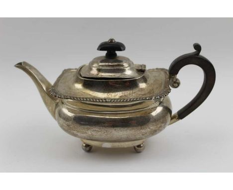 Mappin &amp; Webb, An Edwardian silver bachelor teapot, Georgian design, with gadrooned rim, raised on four ball feet, Birmin