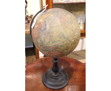 An early 20th century 8 inch terrestrial globe by Geographica Ltd of London on turned wooden baluster column and plinth, the 