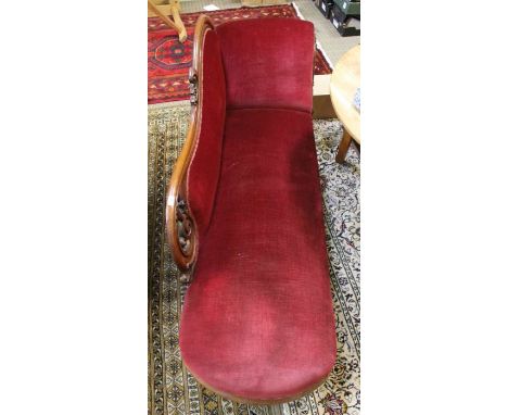 Late 19th century mahogany framed extra long daybed/chaise in dark red velour, the seat 140cm long