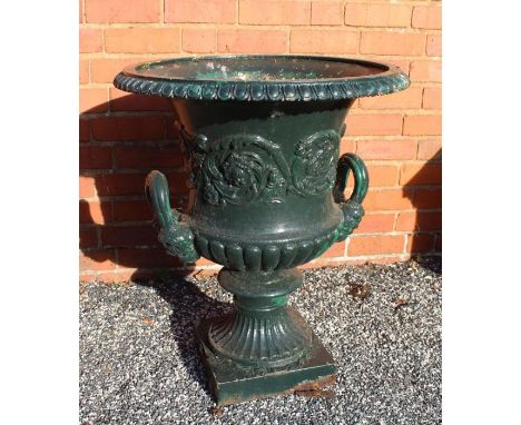 A pair of early 19th century Regency cast iron garden planters, fluted urn form with egg &amp; dart rims, rusty, over painted