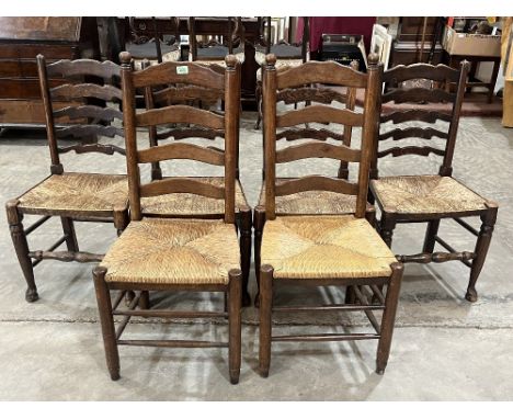 A set of four and a pair of ladder back chairs with rush seats.