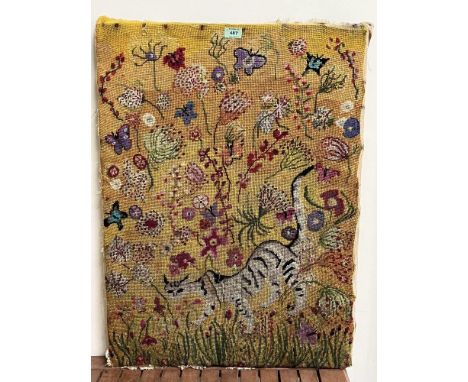 A woolwork tapestry worked with a cat and foliage. 32" x 23½".