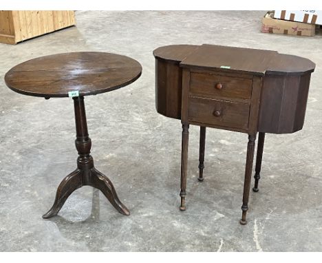 A 19th Century oak snap-top tripod table and a mahogany work table on reeded legs.