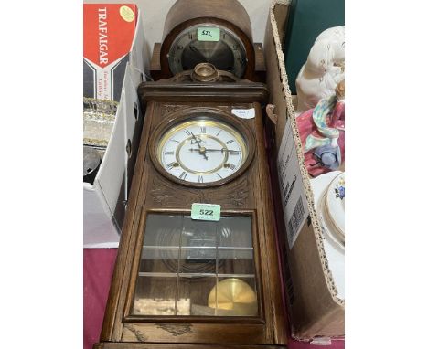 A Vienna style wall clock and an oak mantle clock.