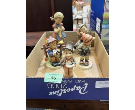 Five Goebel Hummel figures of children.
