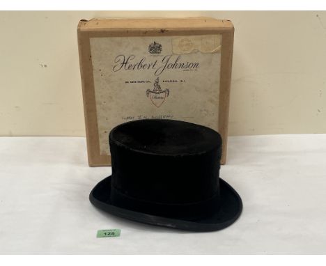 A boxed lady's hunting top hat by Herbert Johnson, London. Interior brim measurement 7½" x 6".