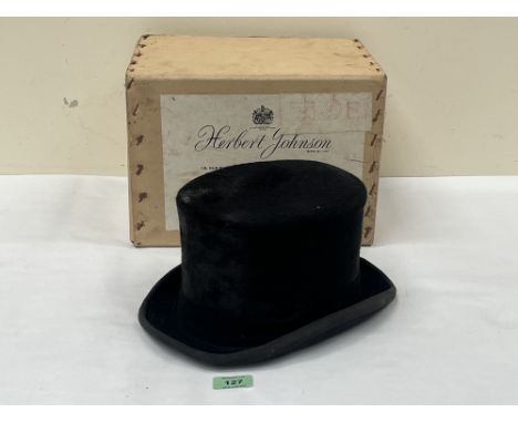 A boxed lady's hunting top hat by Herbert Johnson, London. Interior brim measurement 8" x 6½".