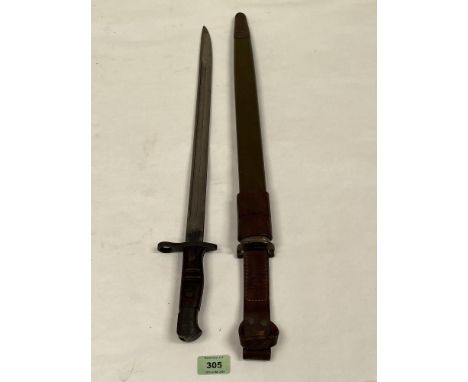 An American WW1 sword bayonet and scabbard.