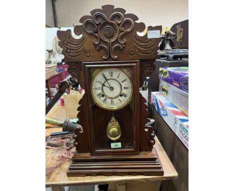 An early 20th Century American mantle clock. 23" high.