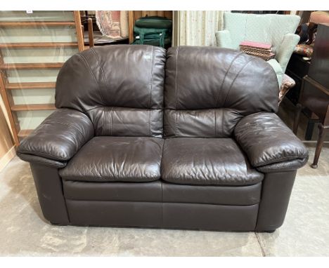 A leather sofa, 60" wide.