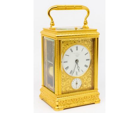 A good French Carriage Clock and case with alarm and repeat. Two-train spring-driven movement, chiming on a gong. 2" round po