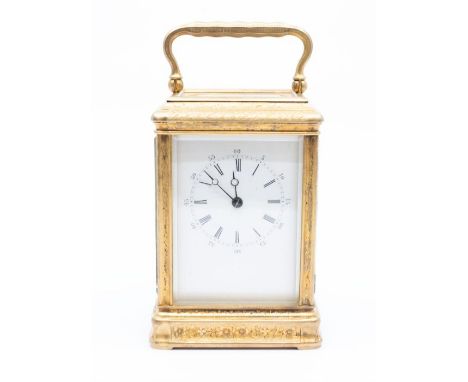 A Drocourt of France carriage clock with engraved brass case. Two-train spring-driven movement, No. 8970, chiming on a gong. 