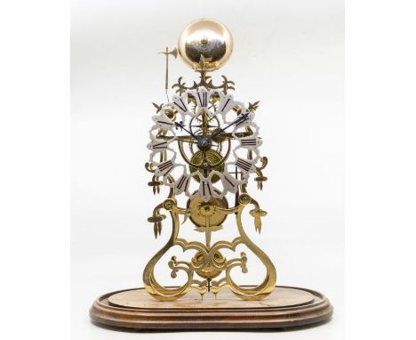 A Victorian-style modern skeleton clock with passing strike. Single train fusée movement, 4-spoke wheel work and 6" pierced s