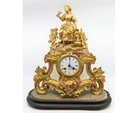 A French mantel clock with two-train spring-driven movement striking on a bell, serial number 69464. Contained in a gilded ca