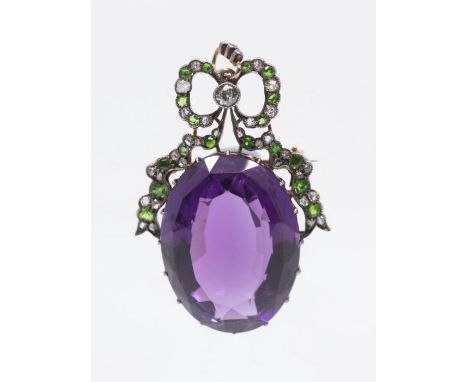 Suffragette Interest - An Edwardian amethyst and diamond suffragette pendant/brooch, comprising a large oval mixed cut amethy