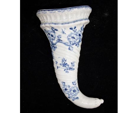 A Worcester Blue and White Cornucopia wall pocket painted with the prunus root flower pattern. Date: circa 1756-60, two workm