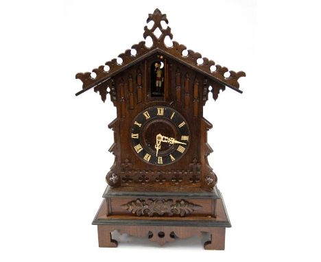 A good Black Forest trumpeter mantel clock. With two train spring driven movement twin bellows and trumpets. A 6" dial with r