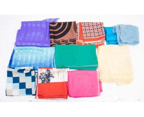 A collection of scarves to include: A large silk scarf depicting a Don Quixote figure holding 'padron pepper' in a Spanish ru
