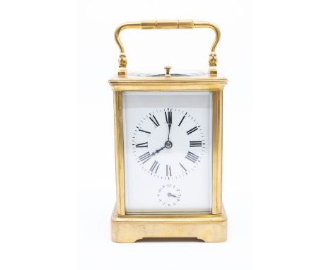 French 8-day Petite sonnerie carriage clock with repeat and alarm on a gong, in a brass cornice case with bevelled glass pane