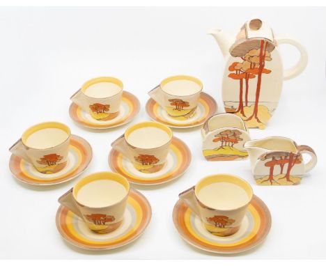 A Clarice Cliff 'Coral Firs' Coffee Set, Bonjour pattern, consisting of coffee pot and cover, cream jug, sugar bowl, six cups