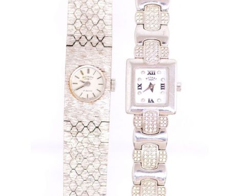 A ladies silver Rotary wristwatch, rectangular white dial with numeral and dot markers, to a stone set bracelet link strap, l