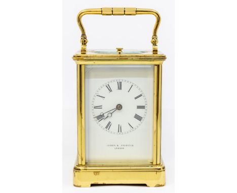 A Carriage Clock retailed by Jenner & Knewstub of London, with repeat. Two-train movement chiming on a gong with striking and