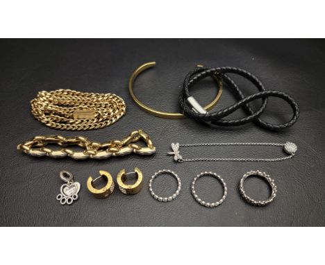 SELECTION OF FASHION JEWELLERYcomprising a Emporio Armani double bracelet, a Tom Astin cuff bracelet, a Rotary bracelet, a Hu