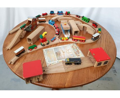 LARGE SELECTION OF BRIOincluding trains, carriages, track, bridges, tunnels and a printed lay out map, together with Thomas t