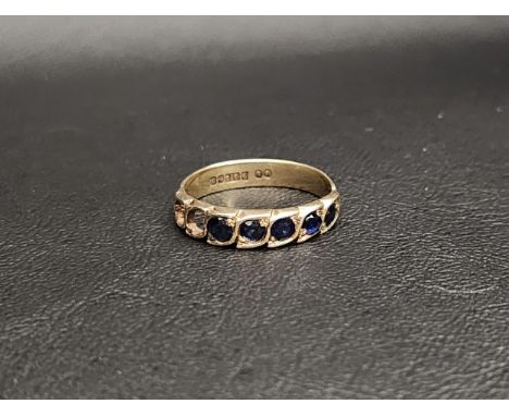SAPPHIRE SET RING in nine carat gold, set with five sapphires (two lacking), ring size S and approximately 2.7 grams 