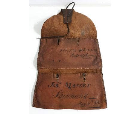 MID 19th CENTURY LEATHER WALLETof fold over design with two internal pockets with button closure and a leather tie, one inscr