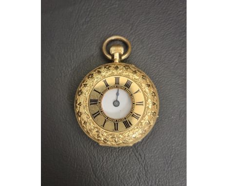 EIGHTEEN CARAT GOLD CASED HALF HUNTER FOB WATCHthe front cover with central glazed panel surrounded by enamelled chapter ring