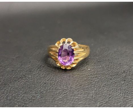 AMETHYST SINGLE STONE RINGthe oval cut amethyst approximately 1.5cts, in eighteen carat gold, ring size M and approximately 5