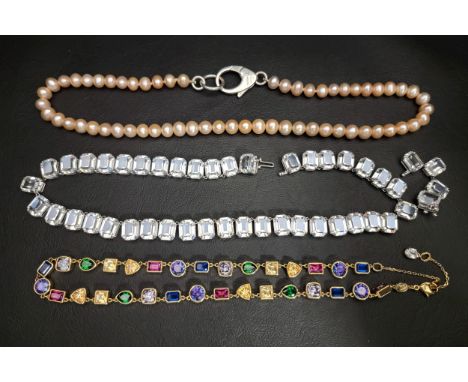 SELECTION OF FASHION NECKLACEScomprising a Swarovski Stilla, a Swarovski Millenia and a Hatton Labs Pink Lobster Pearl chain 