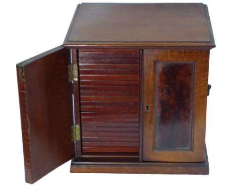 COIN AND OTHER CABINETS, A 1930s Mahogany Collector’s Cabinet, 295mm wide x 265mm deep x 295mm high, containing 20 double pie