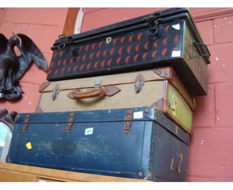 Two suitcases together with one metal trunk. 
