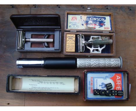 An Otis King patent pocket calculator with box and instructions, Viking playing cards and dice, Valet Auto Strop safety razor