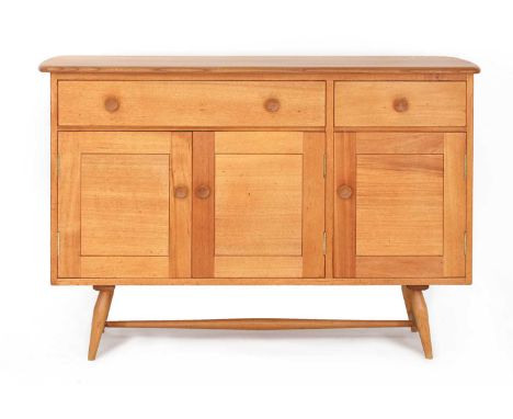 An Ercol '351' beech sideboard,1960s, the top with rounded edges, over two asymmetrical drawers, the wider drawer over a pair