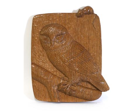 A Robert 'Mouseman' Thompson adzed oak plaque, carved with an owl on a branch with a mouse in its claws, the mouse signature 