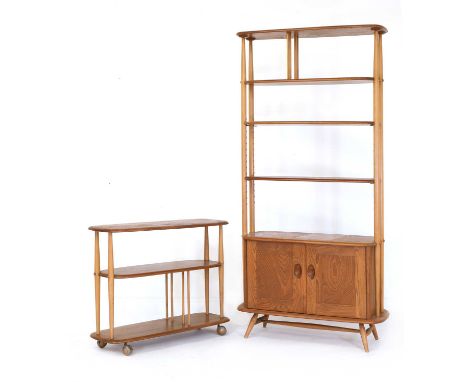 An Ercol elm and beech 'Giraffe' room divider,with two fixed shelves, over two adjustable shelves and a cupboard, 85cm wide40