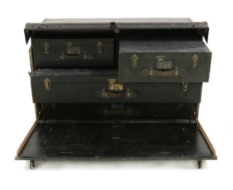 A Finnigans' motoring trunk,with Rexine and leather edging, with plated catches and leather handles, with a fall front openin