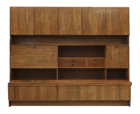 An Archie Shine rosewood three-tier bookcase cabinet, §the top section with a row of cupboards over a shelf, centred with fou