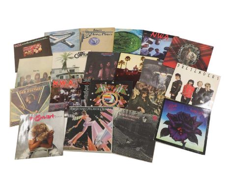 A collection of vinyl albums and singles,including The Beatles 'A Hard Day's Night', 'Help!' and 'Beatles For Sale', Led Zepp