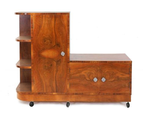 An Art Deco walnut cabinet, with a rounded open three-tier shelf end, a tall cupboard with a lower cupboard to the side, 118c