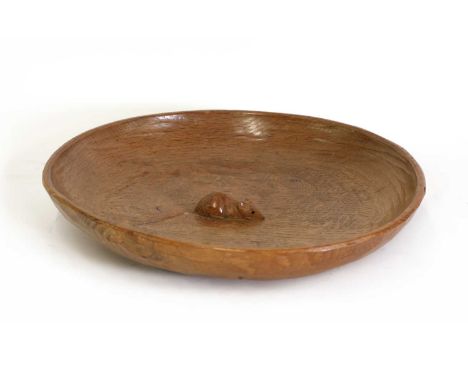 A Robert 'Mouseman' Thompson oak bowl,the bowl adzed to both sides, carved with the signature mouse to the centre, 29.5cm dia