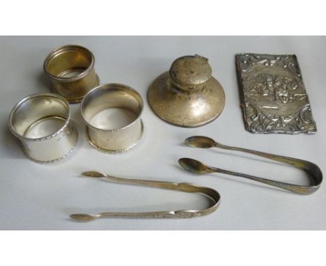 SILVER CAPSTAN INKWELL (FILLED BASE) WITH INDISTINCT MAKER'S MARK, BIRMINGHAM 1916. ALSO THREE SILVER NAPKIN RINGS AND TWO SI