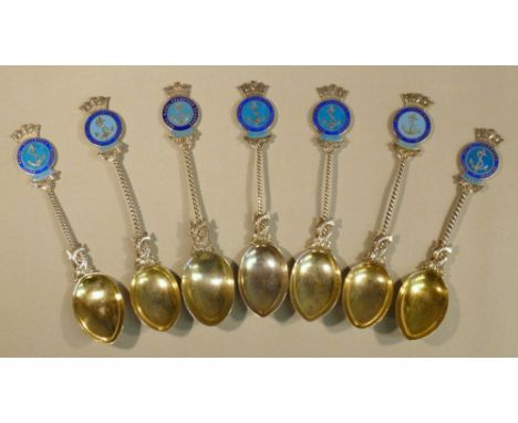 SEVEN SILVER GILT AND ENAMEL ROYAL NAVAL VOLUNTEER RESERVE SPOONS BY VAUGHTON & SONS AND DANIEL GEORGE COLLINS, BIRMINGHAM 19
